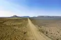Bei Oudtshoorn erleben wir auf unserer Südafrika-Rundreise mit Marco Polo die Weite der Halbwüstenlandschaft der Karoo.