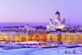 Auf unserer Gruppenreise genießen wir unbeschwerte Tage im Zentrum von Helsinki und bewundern die Stadt in der verschneiten Abendstimmung