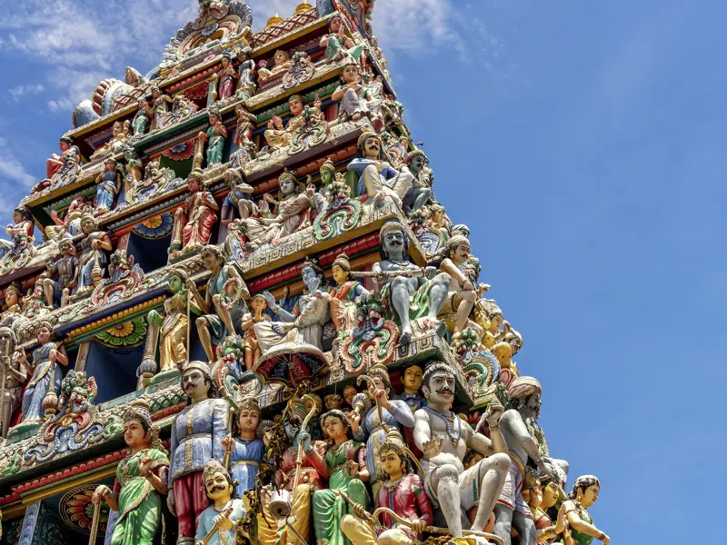 In Madurai erwartet Sie auf Ihrer individuellen Rundreise durch Südindien ein Wolkenkratzer mit Göttern in Bonbonfarben ¿ der Sri-Minakshi-Tempel, die größte Tempelanlage Indiens.