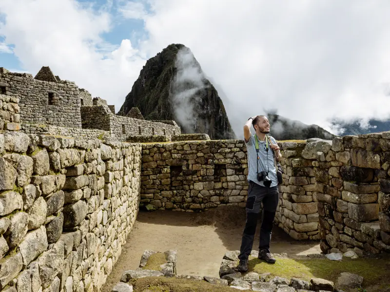 Einer der Höhepunkte Ihrer individuellen Rundreise durch Peru: die in den Kordilleren versteckte Inkastadt Machu Picchu, die erst 1911 wiederentdeckt wurde.