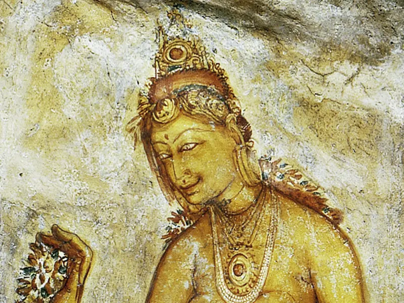 Bei unserer Wanderung während unserer YOUNG LINE Reise für Traveller ab 35 auf den Löwenfelsen in Sigiriya kommen wir auch an den Fresken der Wolkenmädchen vorbei.